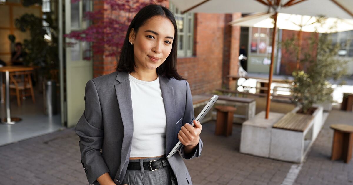 business leader holding digital tablet