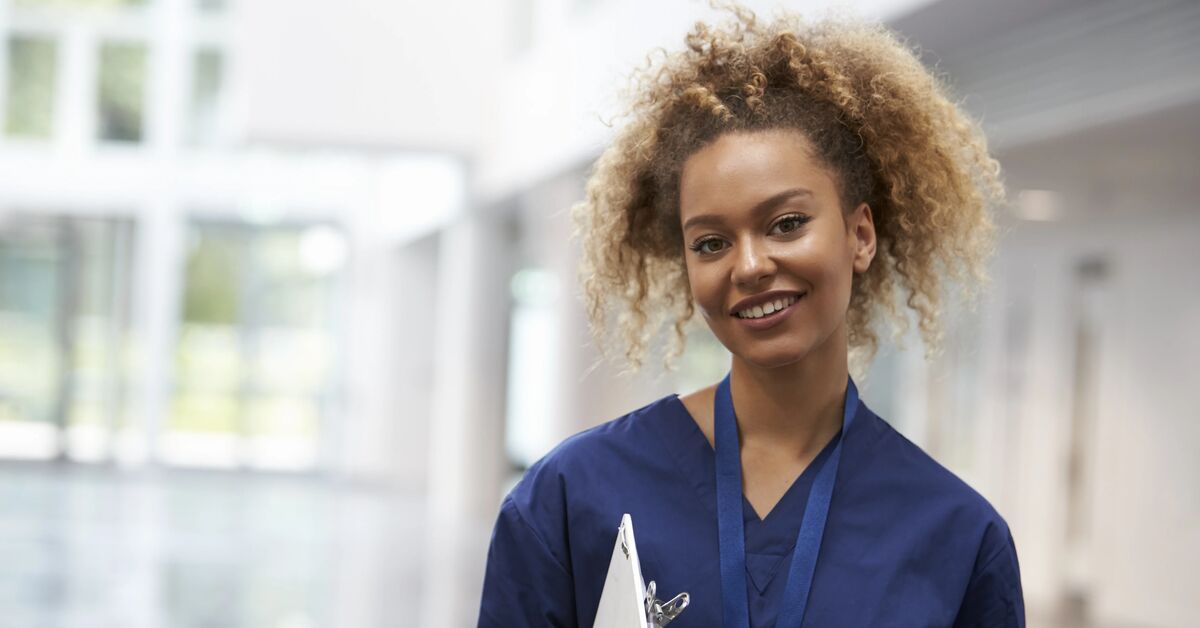Female Nurse Wearing Scrubs In Hospital