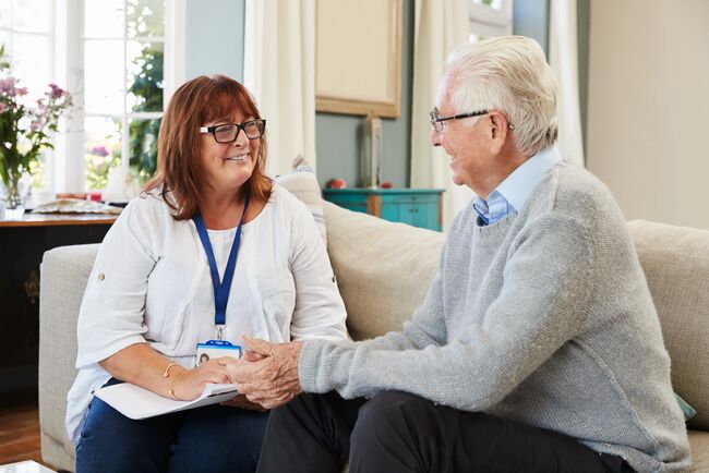 Female Support Worker Visits her patient